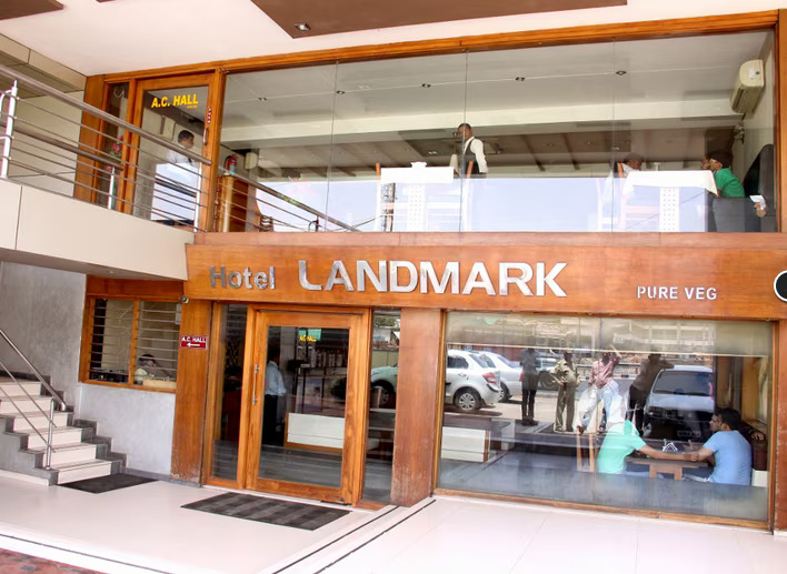 Landmark Hotel grand exterior with elegant architecture at golden hour